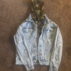 Jean jacket with camouflage hoodie